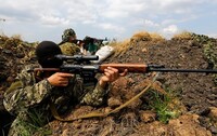 В СНБО заявили о снайперских обстрелах в районе Донецкого аэропорта