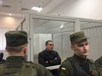 Суд отпустил полицейского Олейника
